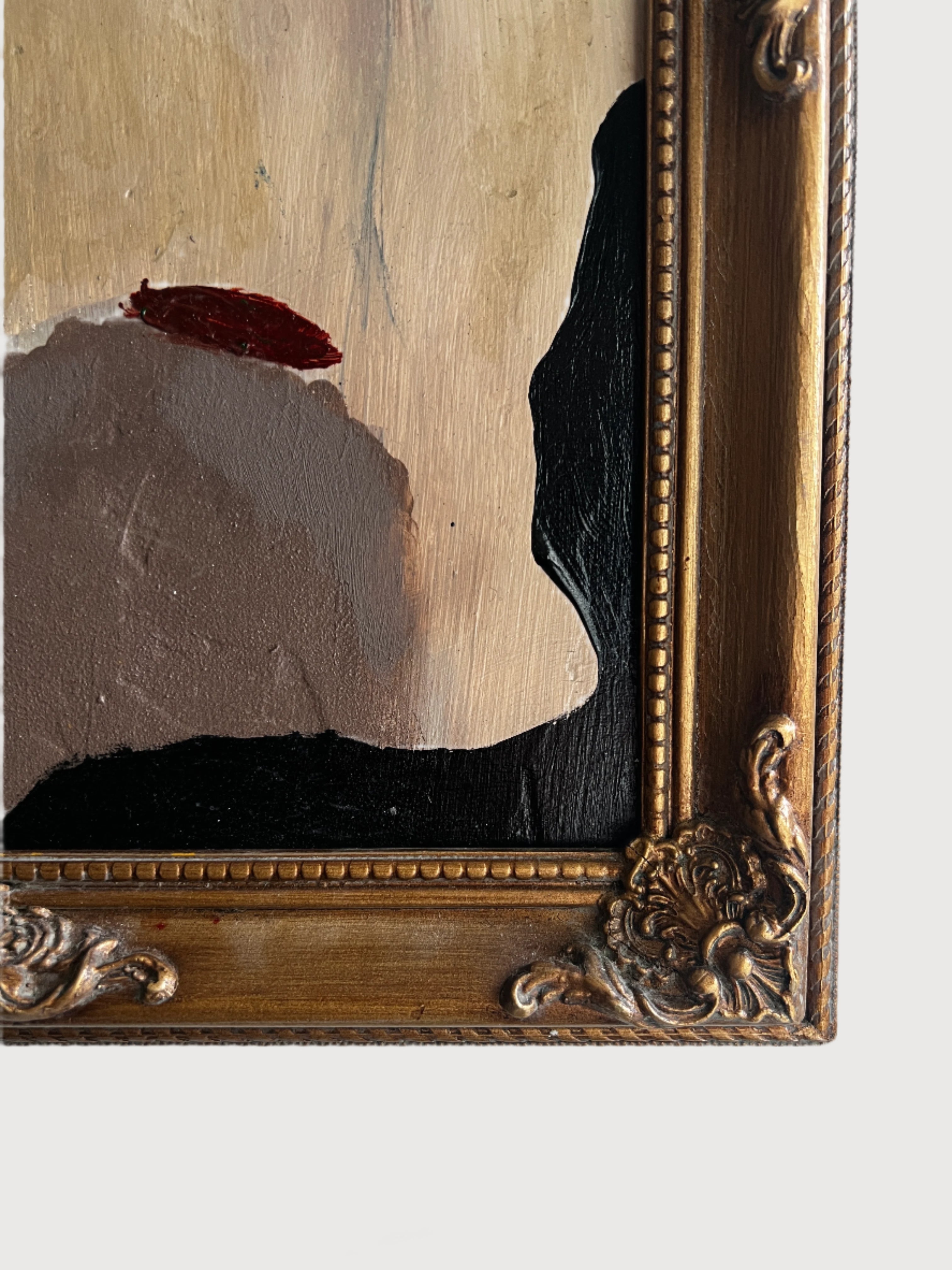 Detail of abstract painting in vintage gold frame