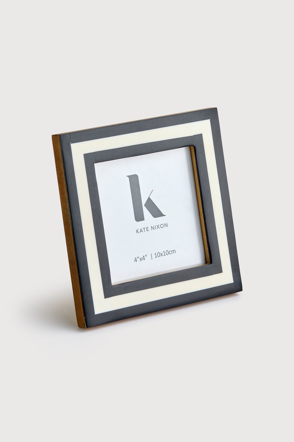 White Kate Nixon Oslo 4x4 photo frame for décor, featuring a sleek white finish and modern design.