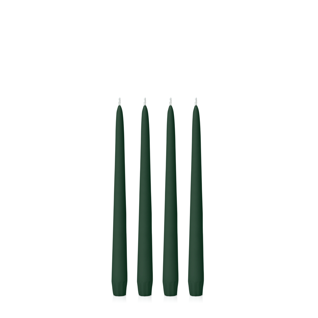 Set of four Hueseeka forest-colored taper candles, 35cm tall, ideal for home decor and decorative centerpieces.