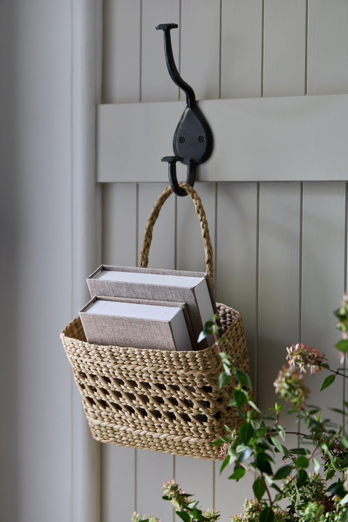Rustic country coat hook from KATE NIXON HOME, made of durable hardware with multiple hooks for hanging coats and accessories.