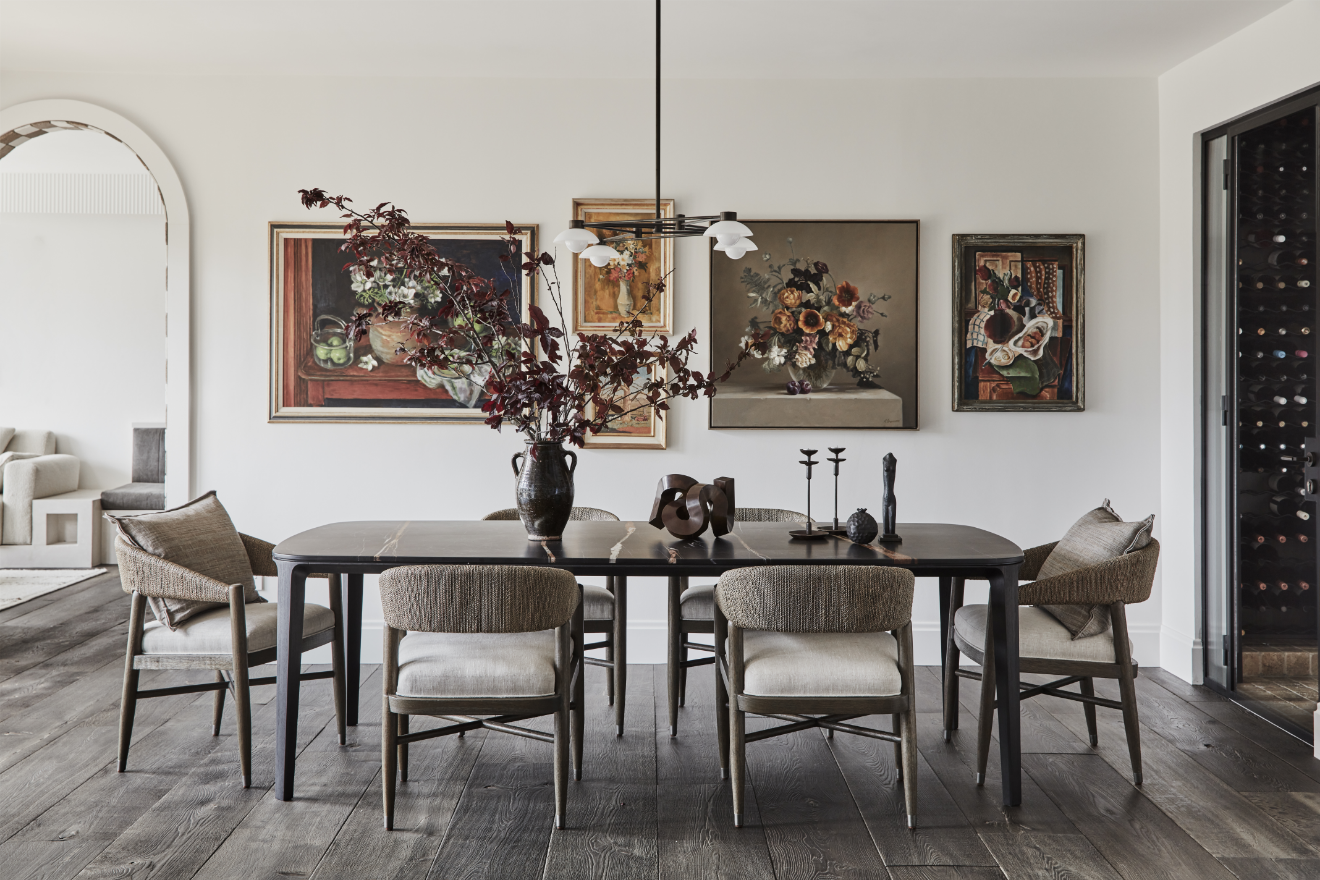 Dining room with gallery art wall and wine cellar