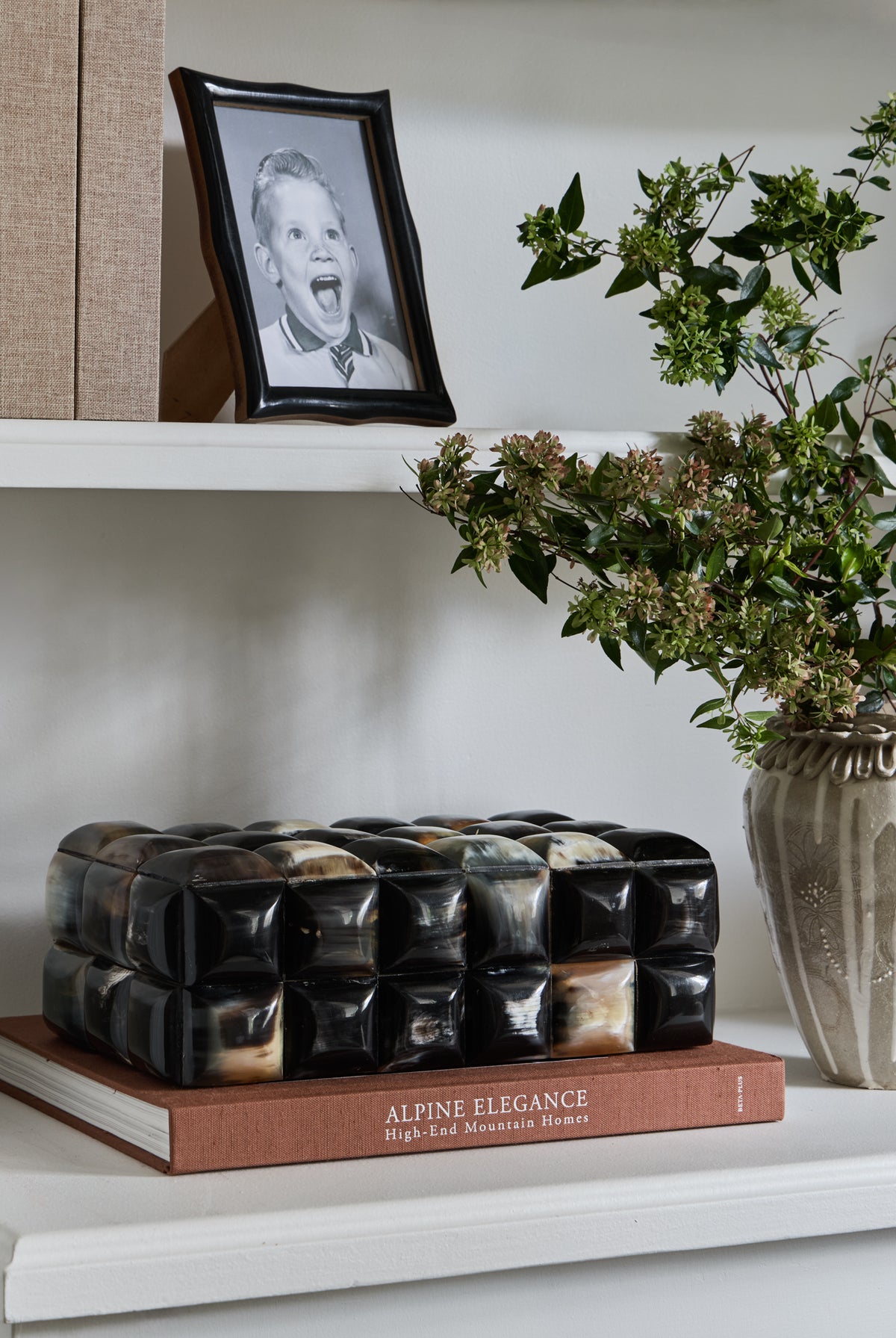Tessera horn decorative box by KATE NIXON HOME on display, featuring a textured natural horn finish