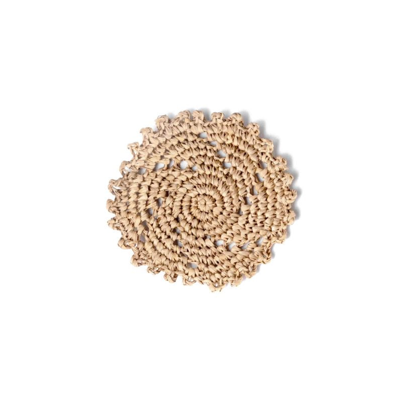 Tanora Akora coaster set made of natural material, showcasing elegant, eco-friendly tableware for protecting surfaces.