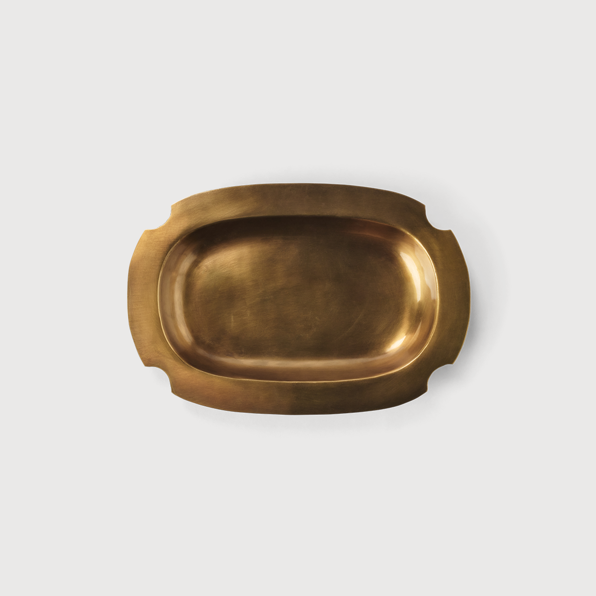 Brass Cade Catchall tray by KATE NIXON HOME, featuring a sleek design for organizing keys and small essentials.