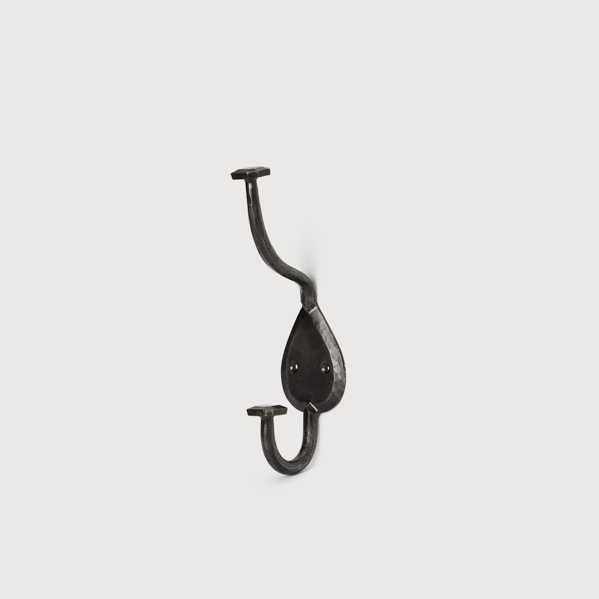 KATE NIXON HOME country coat hook mounted on wooden wall, showcasing vintage-inspired hardware for hanging coats and accessories.