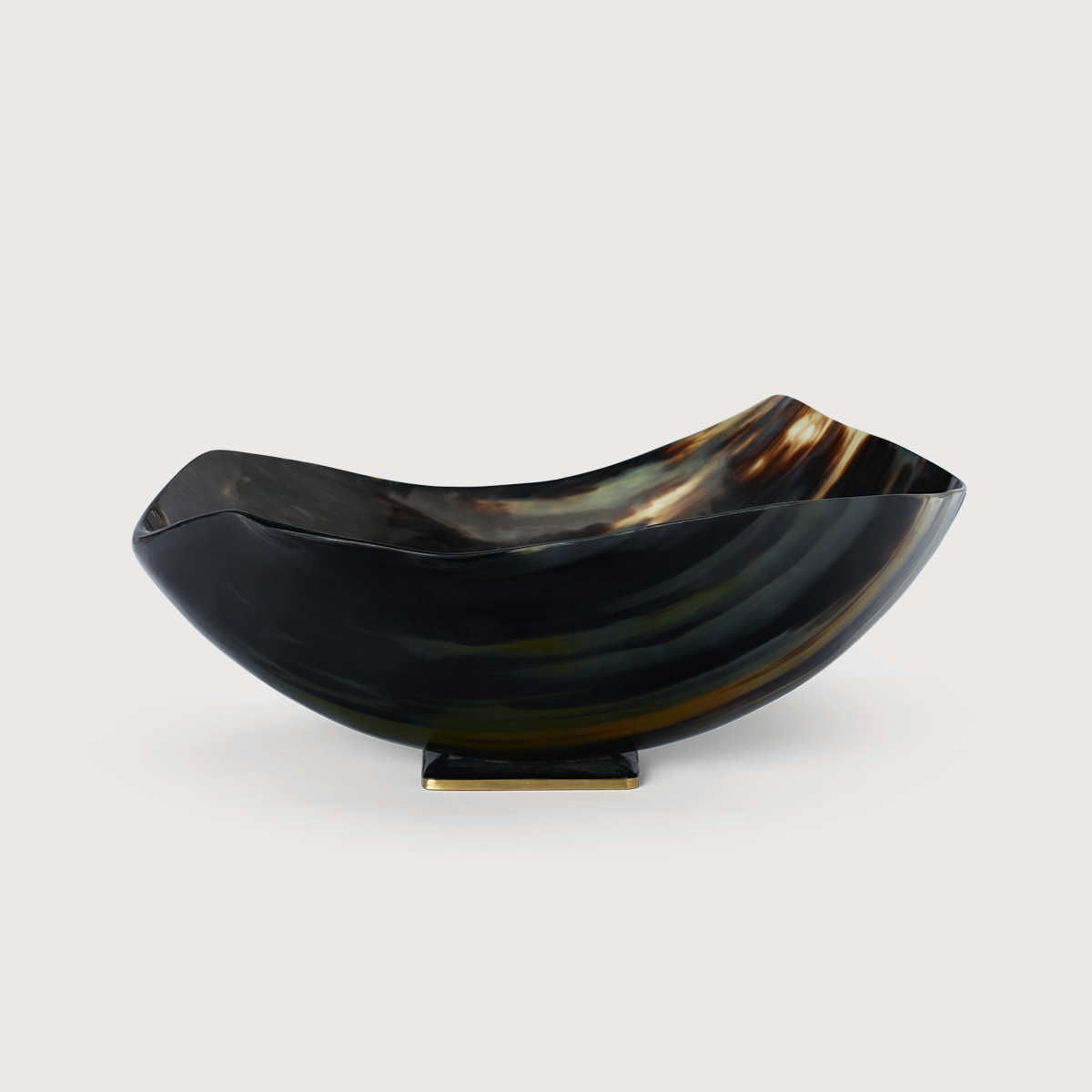 KATE NIXON HOME Patra Horn Bowl showing a smooth, polished horn bowl with natural color variations and elegant design.