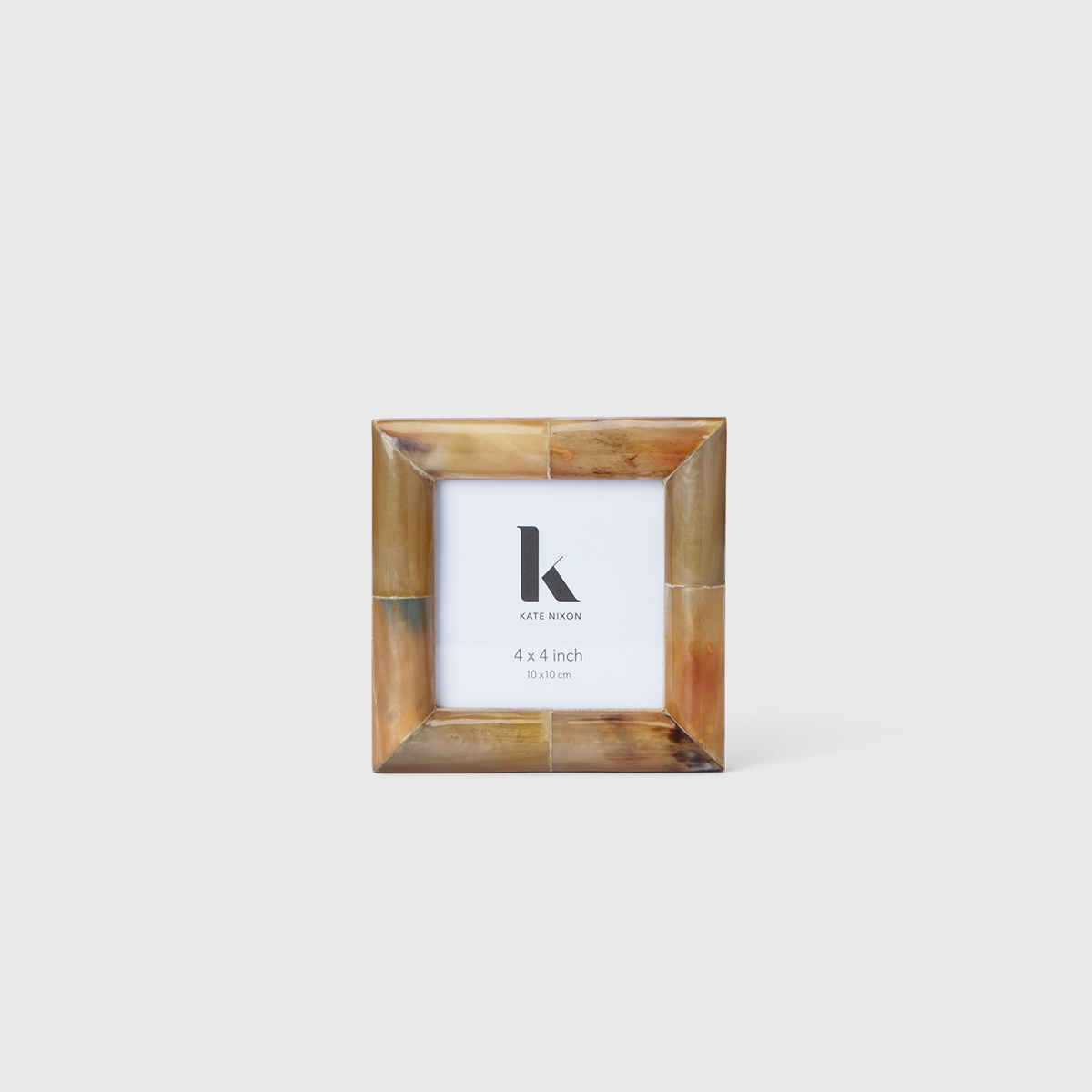 KATE NIXON HOME Mandra 4x4 photo frame with a sleek design, showcasing space for a 4x4 inch photograph.