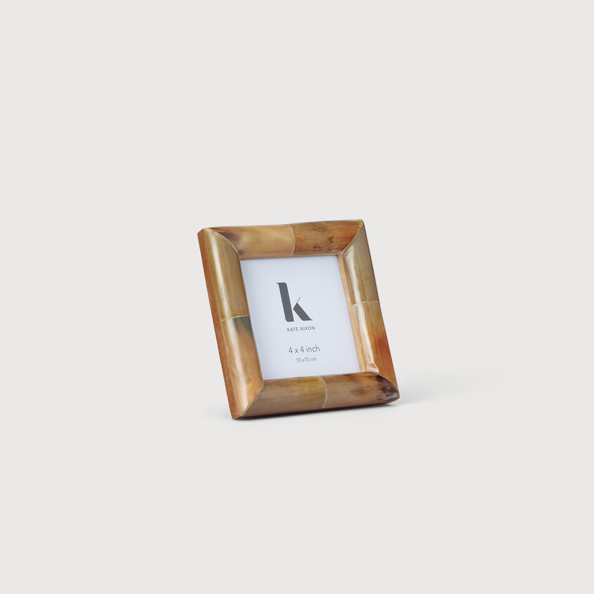 KATE NIXON HOME Mandra 4x4 photo frame showing a wooden frame with a photo placeholder for 4x4 inch pictures.