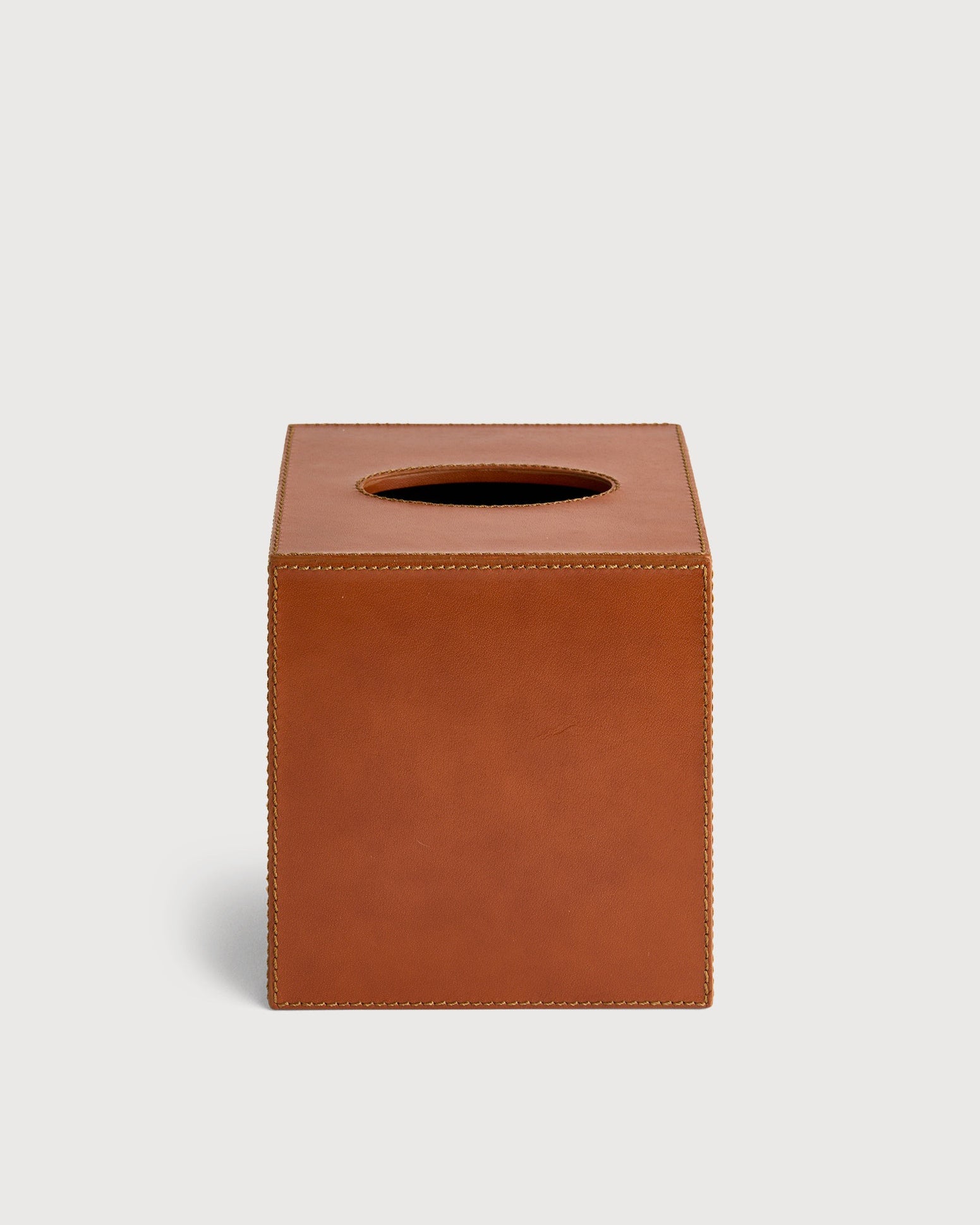 Brown leather tissue box on a white background