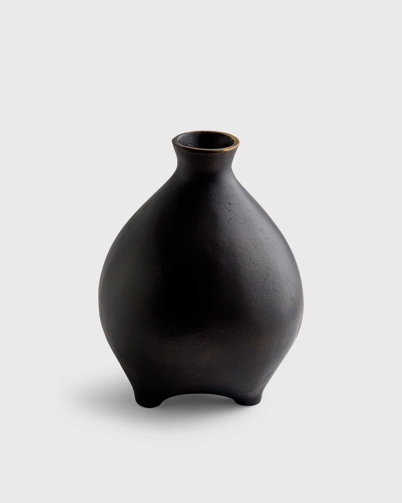 Black vase on a light gray background