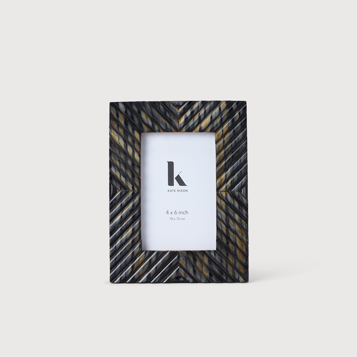 KATE NIXON HOME Tulu 4x6 photo frame with sleek design, holding a 4x6 photograph, ideal for home decor.